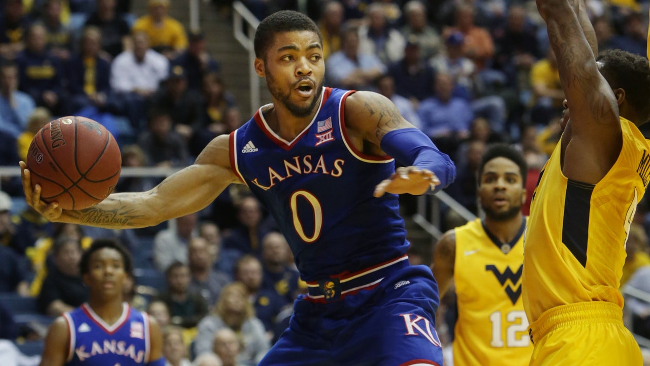 Down goes No. 1: West Virginia trips up Kansas 74-63